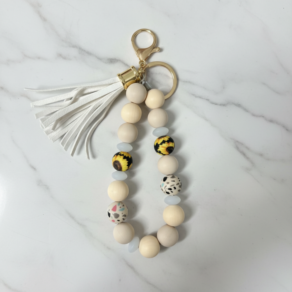 Porte-clés bracelet silicone tournesol fond marbré - vue 1
