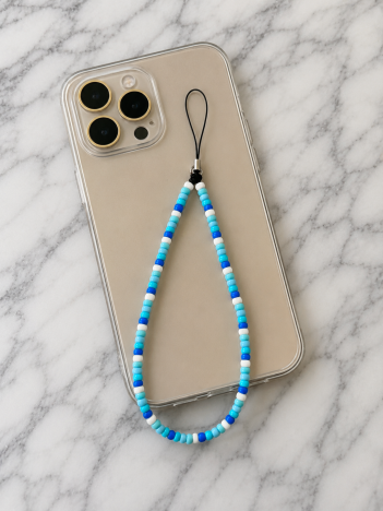 Cordon téléphone perles bleu océan sur smartphone