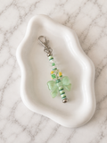 Porte-clés Papillon Vert sur fond marbré