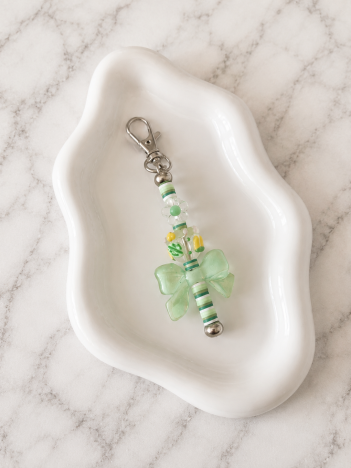 Porte-clés Papillon Vert sur fond marbré