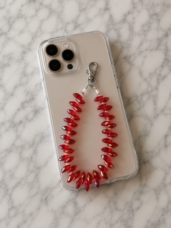 Cordon téléphone perles gouttes rouge rubis sur smartphone