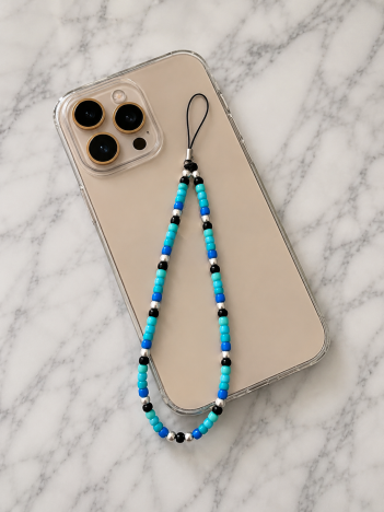 Cordon téléphone perles bleu turquoise noir sur smartphone