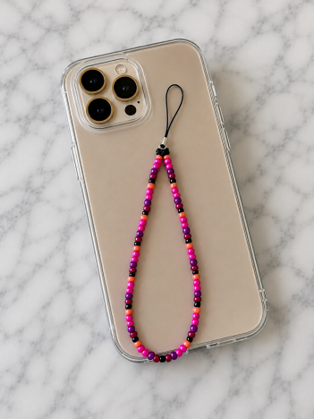Cordon téléphone perles rose fuchsia violet noir sur smartphone