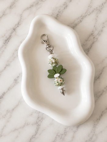Porte-clés Fleur Verte sur fond marbré