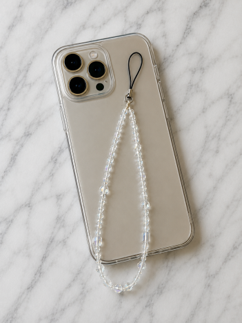Cordon téléphone perles nacrées blanches sur smartphone