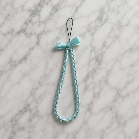 Dragonne Téléphone Tressée Bleu Turquoise Nœud Papillon