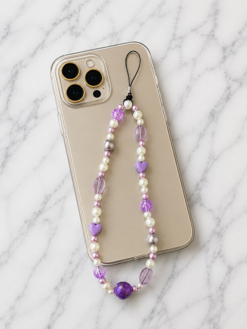 Cordon téléphone perles violettes sur smartphone