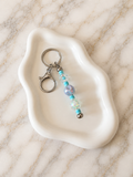 Porte-clés perles irisées bleu-violet et turquoise