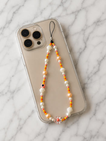 Cordon téléphone perles orangé sur smartphone
