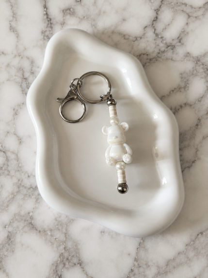 Porte-clés Ourson Blanc sur fond marbré