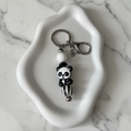 Porte-clés Panda sur fond marbré