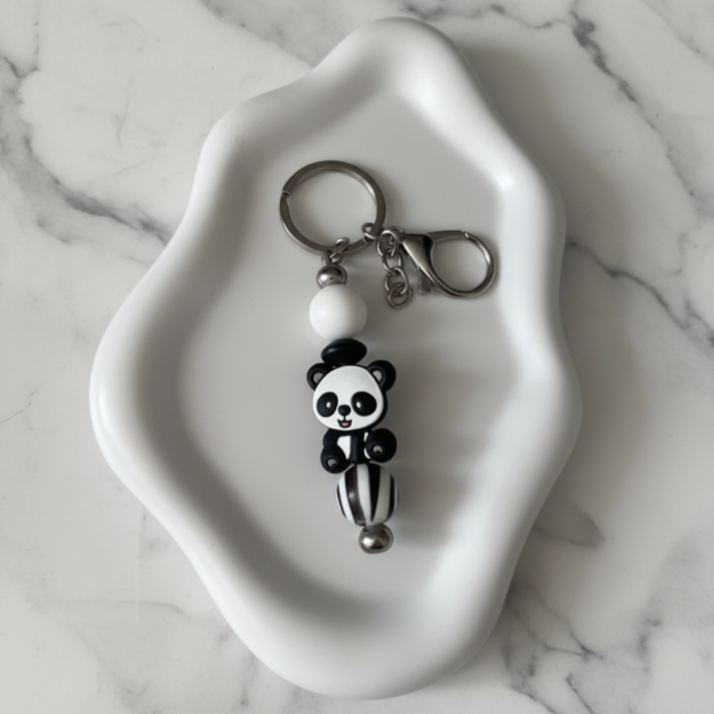 Porte-clés Panda sur fond marbré