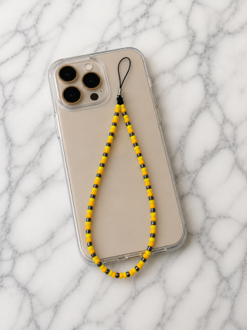 Cordon téléphone perles jaune et noir sur smartphone