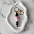 Porte-clés Axolotl Rose - fond marbré