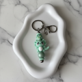 Porte-clés Axolotl Vert - fond marbré