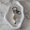 Porte-clés Marguerite - fond marbré