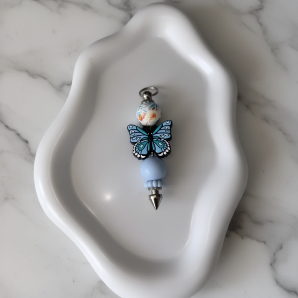 Porte-clés Papillon Bleu - fond marbré