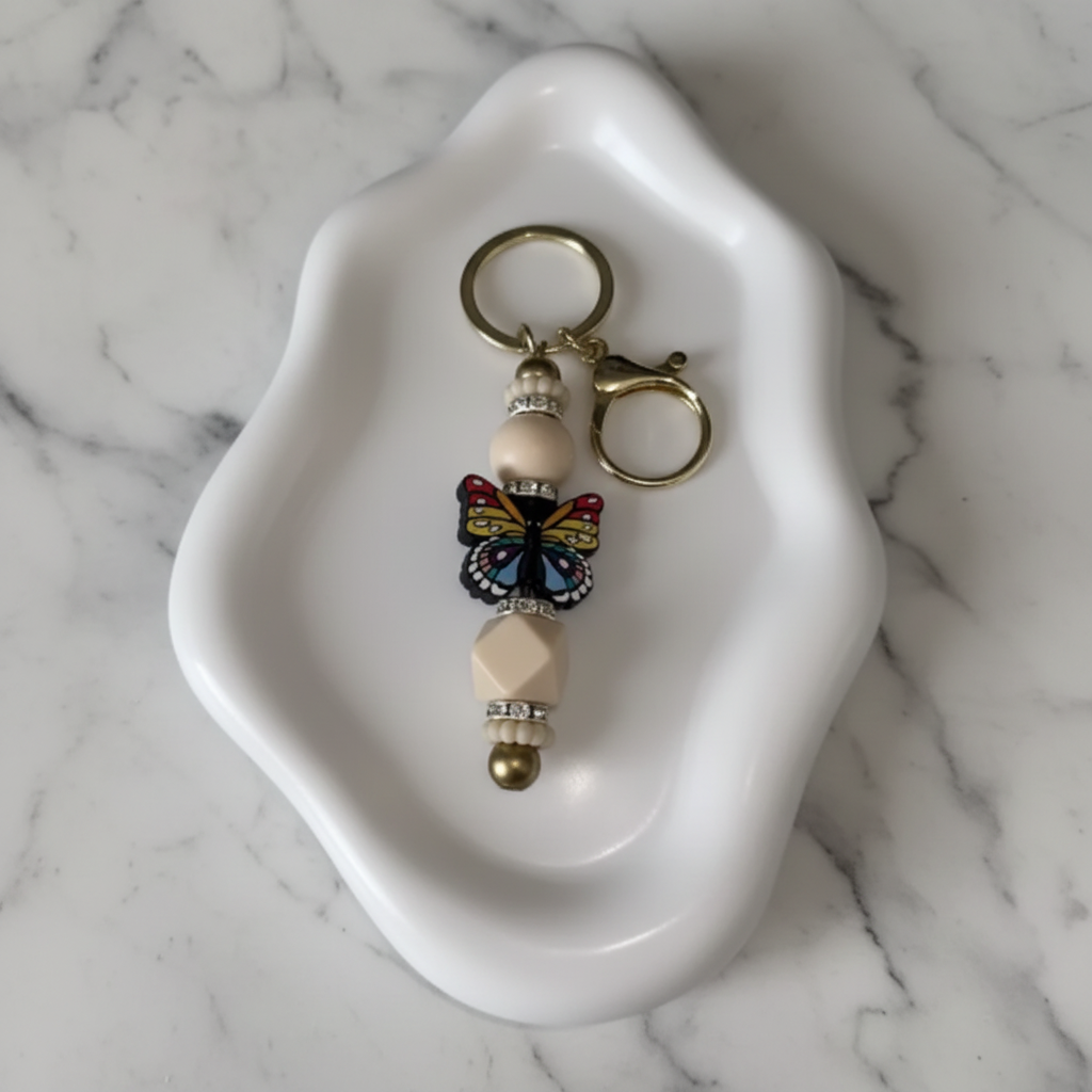Porte-clés Papillon Coloré - fond marbré