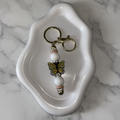 Porte-clés Papillon Jaune - fond marbré