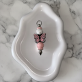 Porte-clés Papillon Rose - fond marbré