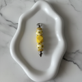 Porte-clés Perles Jaunes - fond marbré